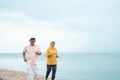 Muslim old couple workout and running at the beach Royalty Free Stock Photo