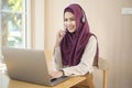 Muslim operator woman in headset using computer answering customer call in office, Customer service concept Royalty Free Stock Photo