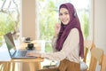 Muslim operator woman in headset using computer answering customer call in office, Customer service concept Royalty Free Stock Photo