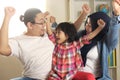 Muslim parents and little babgy girl, father and mother with their daughter, happy smiling plays together