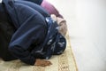 Muslim people are bowing down