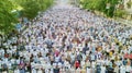 Muslim people praying Eid Al Fitr on the road Royalty Free Stock Photo