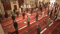 Muslim People Praying With Mosque Teacher Imam Who Reads Qur`an