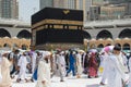 Muslim pilgrims at The Kaaba during tawaf. Holy Kaaba in the Masjid Haram