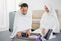 Muslim pilgrims wife and husband prepare item