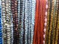 Muslim prayer chaplet market close up shot. Colorful plastic rosaries close up shot in the market. Religious beads with colorful Royalty Free Stock Photo