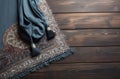 Muslim prayer corner rug on wooden floor. Generate ai