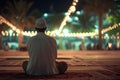 Muslim prayer sitting at Ramadan night with selective focus, neural network generated image