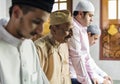 Muslim prayers in Tashahhud posture