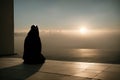 Muslim praying in a mystical environment, silhouette, no face visible, generative ai, color grading Royalty Free Stock Photo