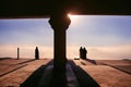 Muslim praying in a mystical environment, silhouette, no face visible, generative ai, color grading Royalty Free Stock Photo