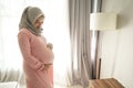 Muslim pregnant woman asian