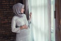 Muslim pregnant woman asian