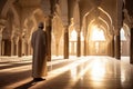 Muslim priest, also known as an Imam, standing in prayer within the beautiful confines of a mosque. AI Generated