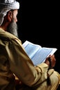 Muslim reading Koran Royalty Free Stock Photo