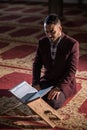 Muslim reading Koran Royalty Free Stock Photo