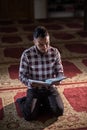 Muslim reading Koran Royalty Free Stock Photo