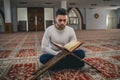 Muslim reading Koran Royalty Free Stock Photo