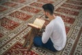 Muslim reading Koran Royalty Free Stock Photo