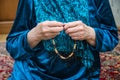 Muslim rosary in the hands of an elderly woman