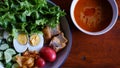 Muslim salad with sauce on wood table and have some space for write wording