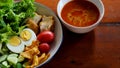 Muslim salad with sauce on wood table and have some space for write wording