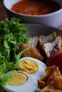 Muslim salad with sauce on wood table and have some space for write wording