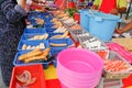 Muslim shoppers buying food from street vendor for breaking fast