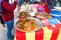 Muslim shoppers buying food from street vendor for breaking fast