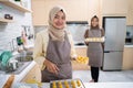 muslim small business owner making homemade nastar snack to sel
