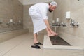 A Muslim takes ablution for prayer. Islamic religious rite