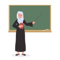 Muslim teacher, professor standing in front of blackboard teaching student in classroom at school?.