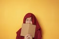 Muslim Teenage Girl Reading Book and Thinking, Happy Smiling Expression Royalty Free Stock Photo