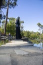 Muslim tourist girl standing and looking to the water Royalty Free Stock Photo