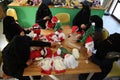 Muslim veiled women make Christmas games in Gaza Strip Royalty Free Stock Photo