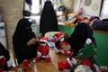 Muslim veiled women make Christmas games in Gaza Strip Royalty Free Stock Photo