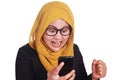 Muslim Woman Angry While Reading Text Message on Smart Phone Royalty Free Stock Photo