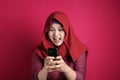 Muslim Woman Angry While Reading Text Message on Smart Phone Royalty Free Stock Photo