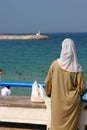 Muslim woman at the beach Royalty Free Stock Photo