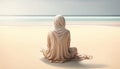 Muslim woman on the beach with copy space