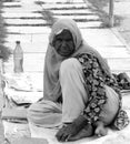 Muslim woman begging in the street