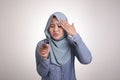 Muslim woman confused and worried when holding credit card