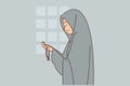 Muslim woman dressed in chador prays in mosque or performs namaz asking allah for help