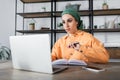 muslim woman in headkerchief and orange