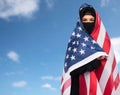 Muslim woman in hijab with american flag Royalty Free Stock Photo