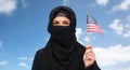 Muslim woman in hijab with american flag Royalty Free Stock Photo