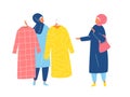 Muslim Woman in hijab shopping in clothes store. Flat design vector.