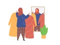 Muslim Woman in hijab shopping in clothes store. Flat design vector. Royalty Free Stock Photo