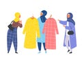 Muslim Woman in hijab shopping in clothes store. Flat design vector.