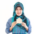 Muslim Woman holding a house model for housing concept Royalty Free Stock Photo